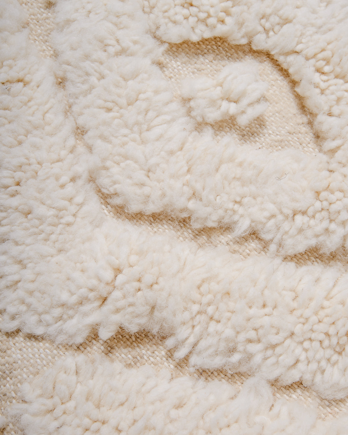 Modern, designer, handcrafted Berber rug from Morocco. Beniourain carpet with beautiful colours and patterns and fluffy wool texture.